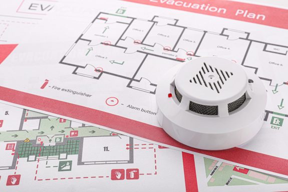 Smoke detectors on evacuation plans